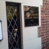 small sign next to the door